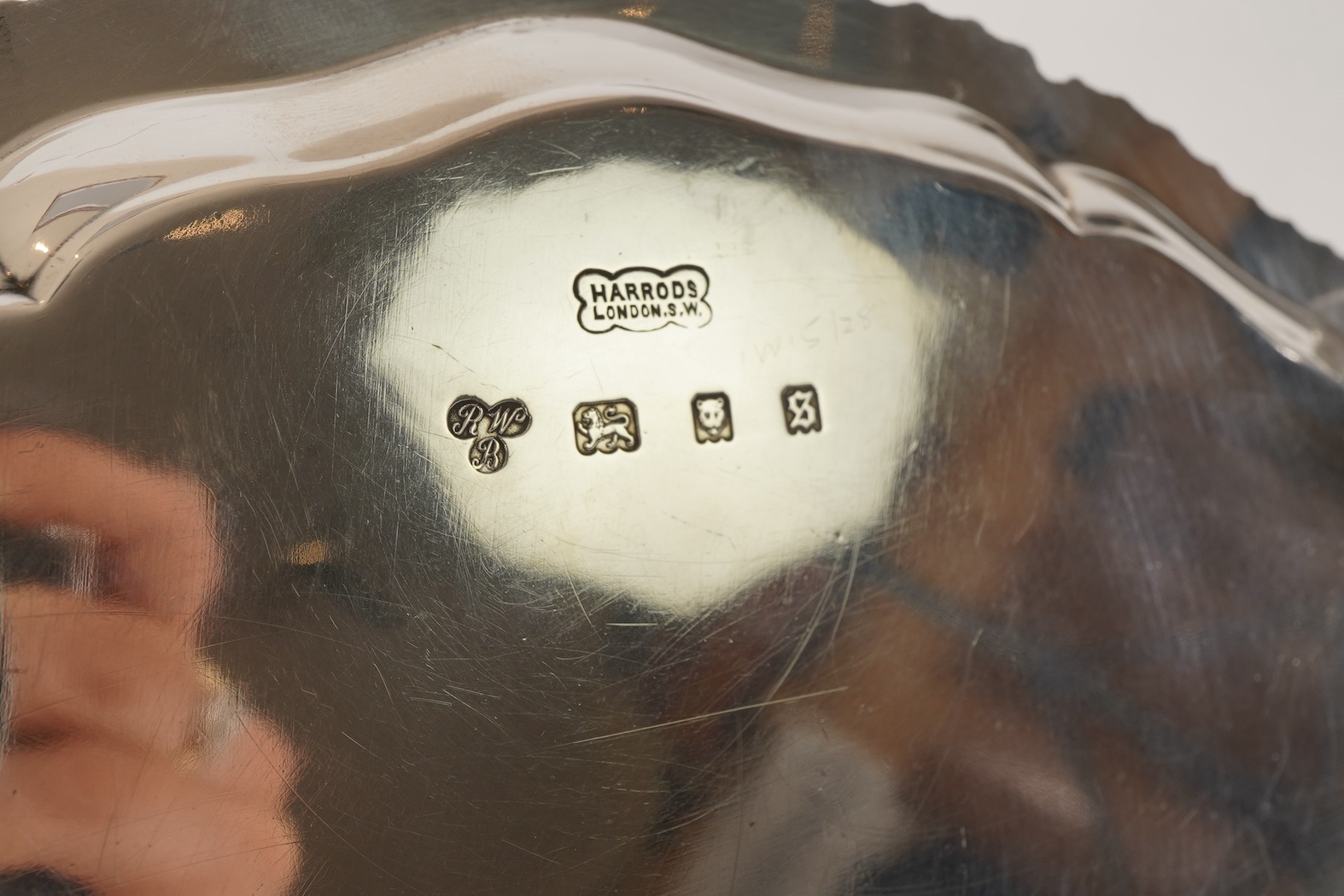 A George V silver salver, by Harrods Ltd